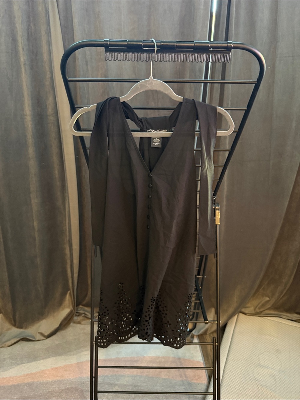 Simply Irresistible Black Sleeveless V-Neck Mini Dress with Eyelet Hem